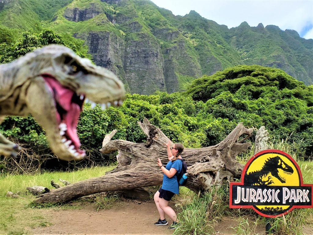 T-rex at Jurassic Park log and sign at Kualoa Ranch