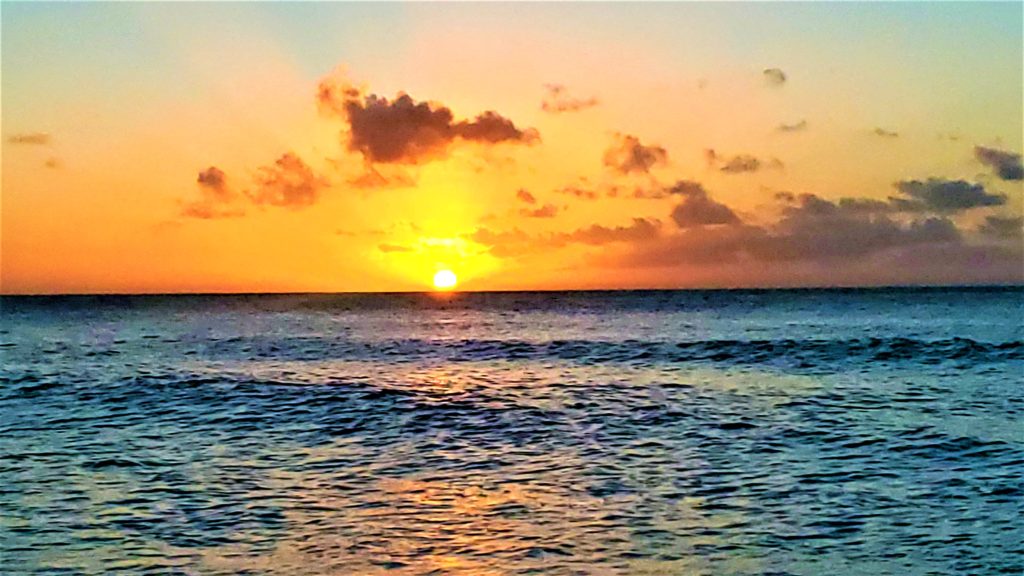 Sunset over the water at Banzai Pipeline Oahu