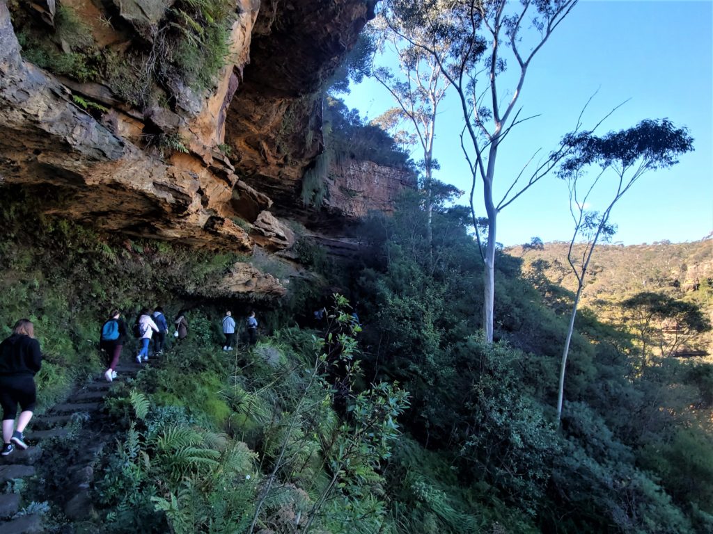 Walking under the cliffs to Wentworth Falls at Blue Mountains